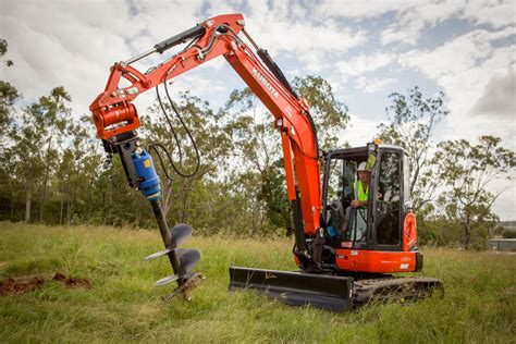 mini excavators drill|mini excavator tiller attachment.